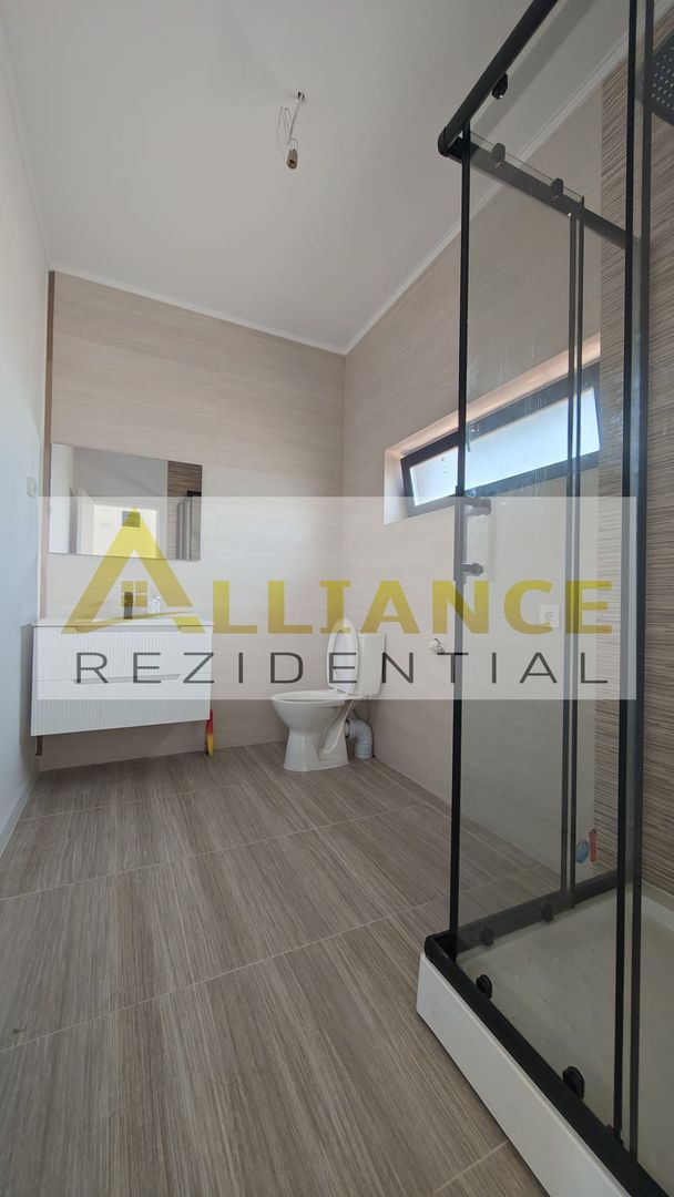Casa pe parter cu 3 camere, 2 bai si teren de 375 mp - Poză 9
