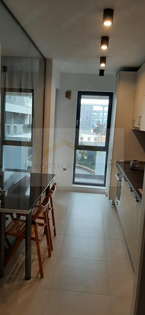 Apartament de închiriat 2 camere Nusco City Pipera | Vedere către grădina - Poză 6