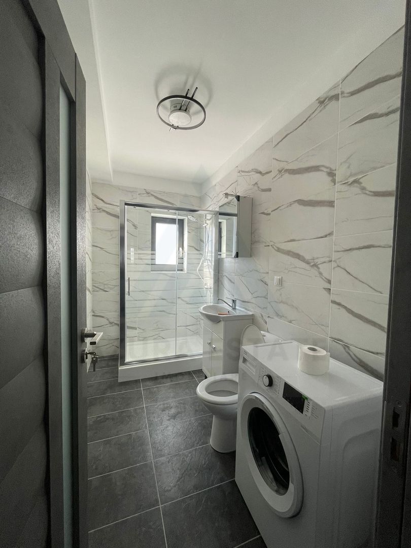 Apartament modern 2 camere 50 mp parter  zona Doamna Stanca - Poză 9