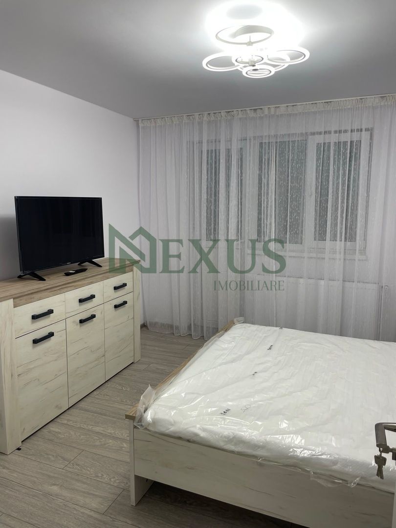 Apartament cu 2 camere, renovat complet, str.Libertății, Moinesti - Poză 2