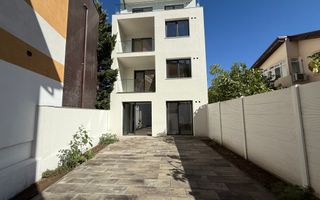 Apartament cu o curte generoasa de 60 mp - Poză 1