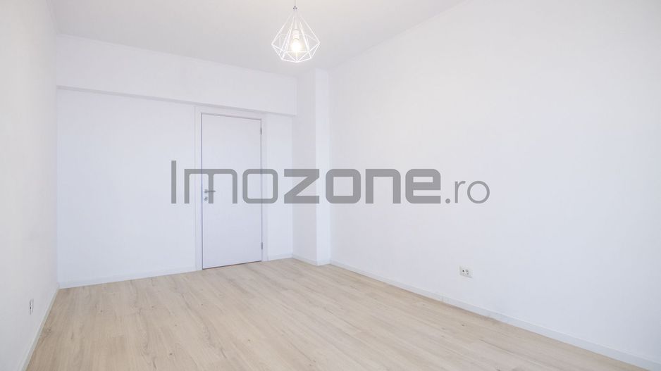 Ansamblul Primavara, 2 camere, decomandat, 74mp, finisat modern si centrala noua - Poză 3