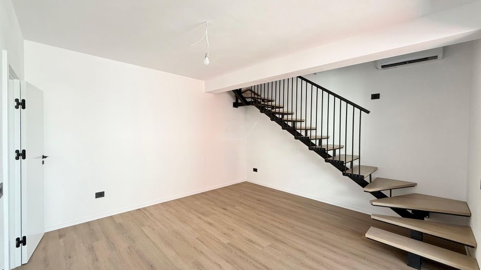 Ap pe 2 niveluri. Bucatarie inchisa, 2 bai. 2 locuri de parcare. - Poză 2