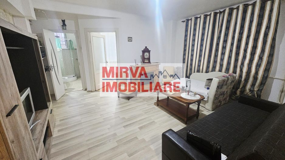 Apartament 2 camere Ultracentral cu garaj inclus | Mobilat și utilat - Poză 1