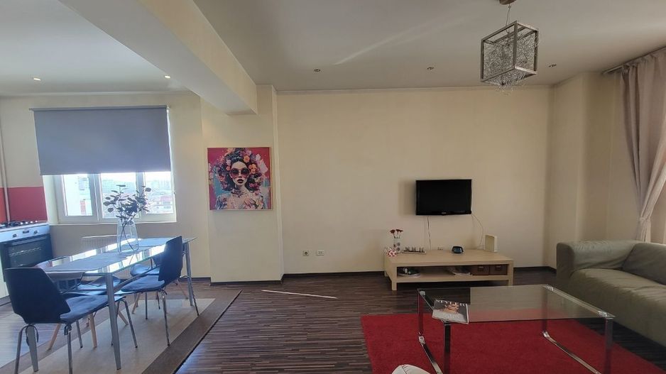 Închiriez apartament 2 camere, Decebal, openspace, parcare inclusă - Poză 1