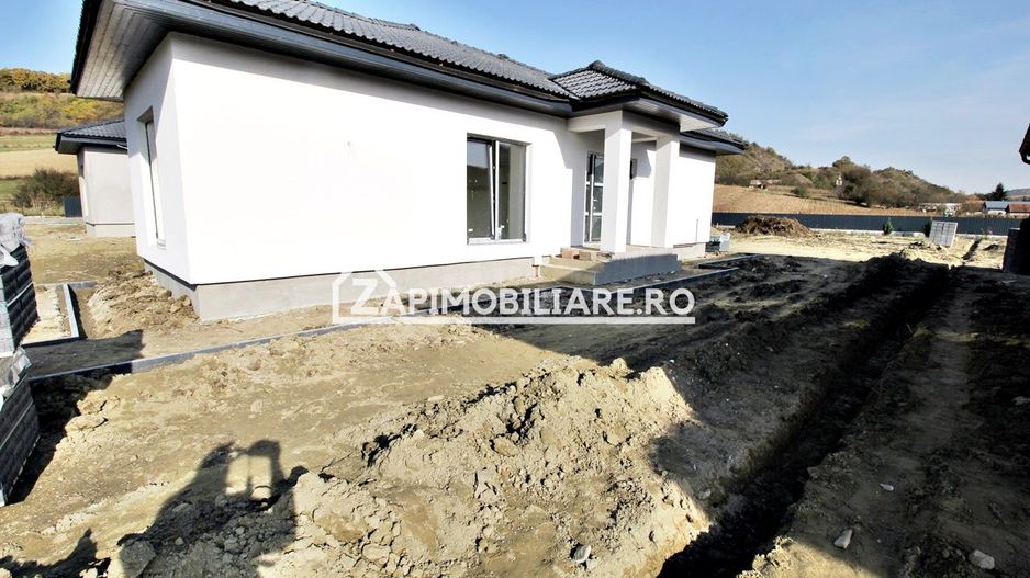 Casă la cheie pe 1 nivel 4cam. 2 bai,1 dresing 650 mp. teren - Poză 22
