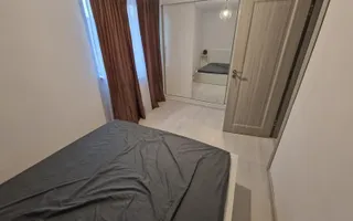 Apartament 2 camere de închiriat în Alexandru cel Bun, renovat integral și mobilat modern - Poză 18