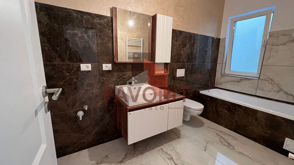 Bucatarie inchisa. 2 bai. Spatiu de depozitare in Pod. - Poză 15