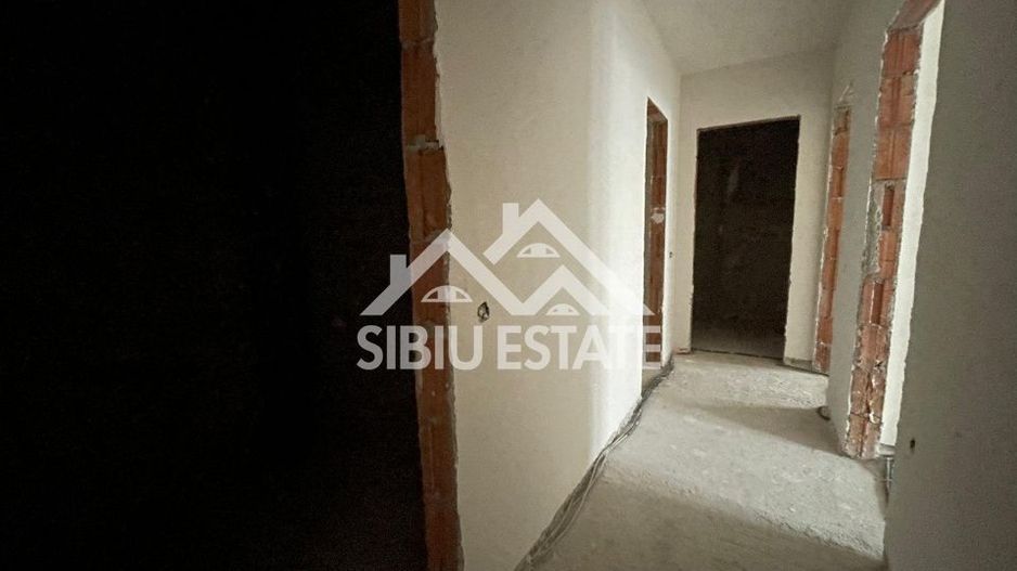 Apartament decomandat cu 3 camere, 2 bai -s.utila 61.57 mp - loc de parcare - Poză 4