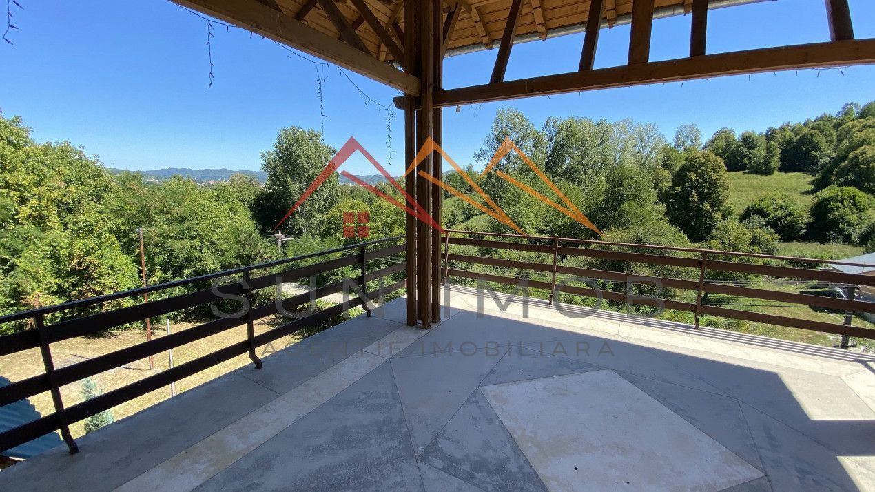 Vila de vanzare, teren 3100 mp, 7 camere, 6 grupuri sanitare, 3 CT, an 1997 - Poză 39