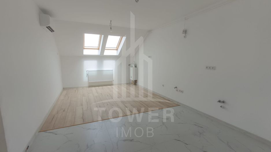 Garsonieră la mansardă, bloc nou - Poză 2