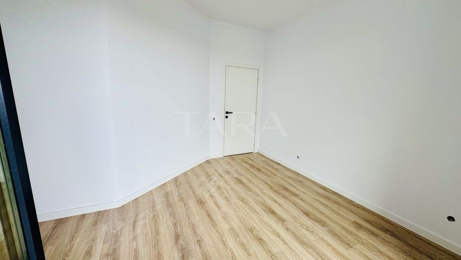 Apartament 2 camere finisat cu terasa si parcare subterana. - Poză 2