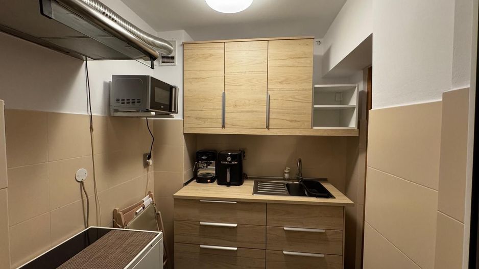 Garsoniera Centrul Civic bloc de apartamente - Poză 14