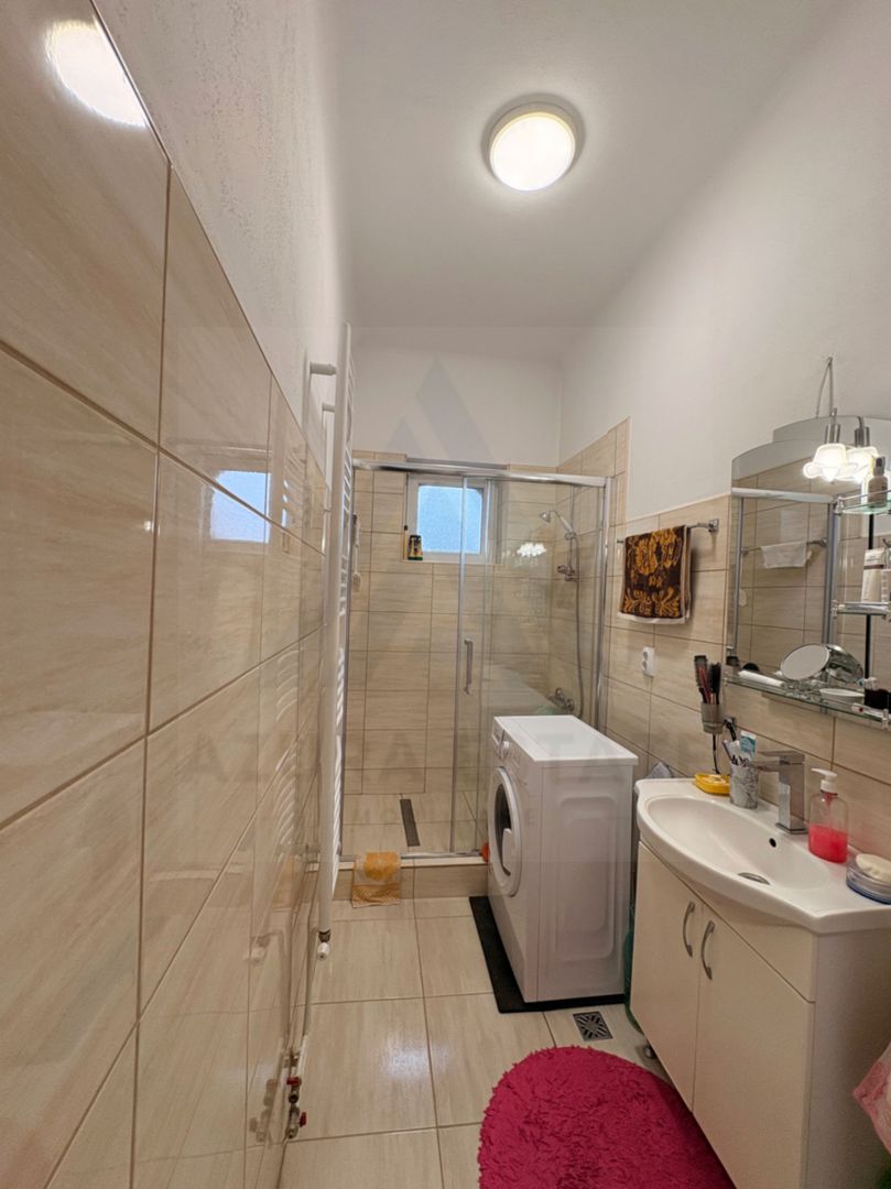 Apartament decomandat 70 mp utili 2 bai pivnita si curte 58 mp Central - Poză 15