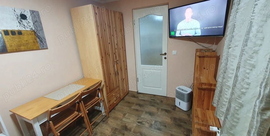 Închiriez garsonieră la casă,  Unirii, centrală proprie - Poză 5