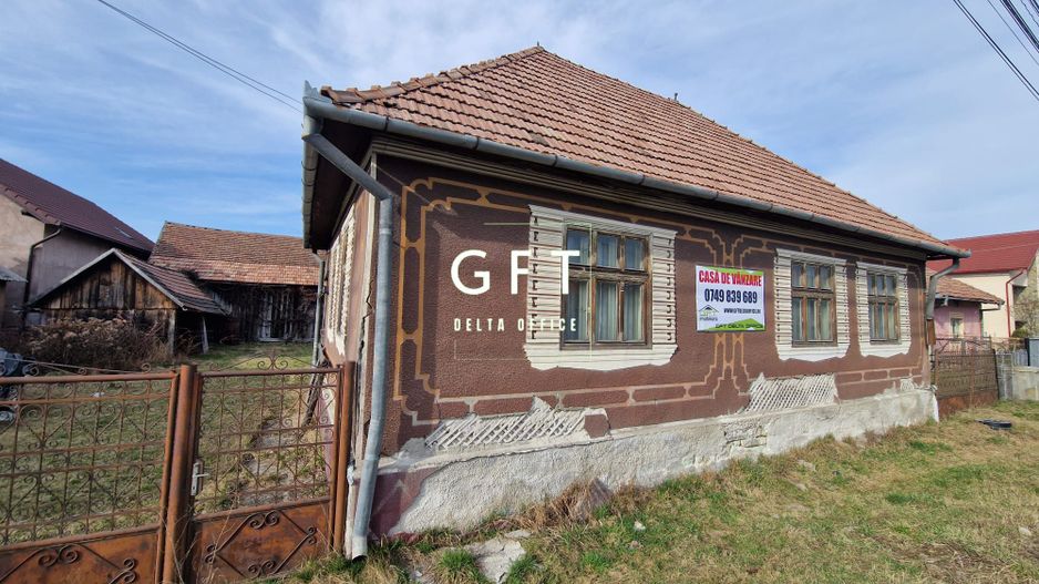 Casa Rusu Bargaului cu 20 ari de teren - Poză 1