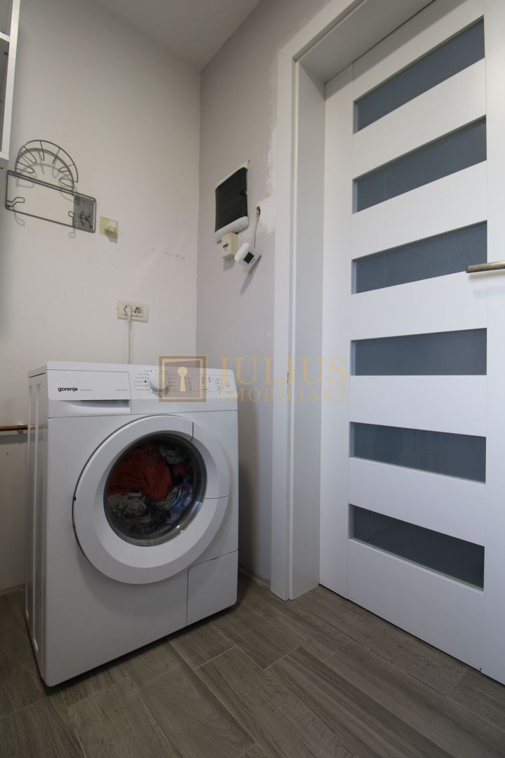 Garsoniera la casa, curte interioara si loc de parcare inclus - Poză 10