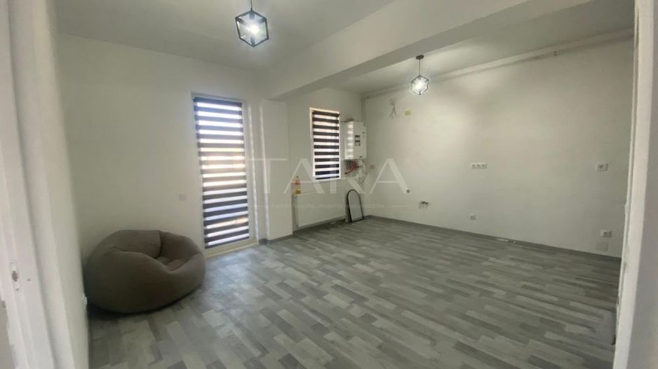 Apartament 3 camere cu terasă generoasă și garaj inclus. - Poză 1