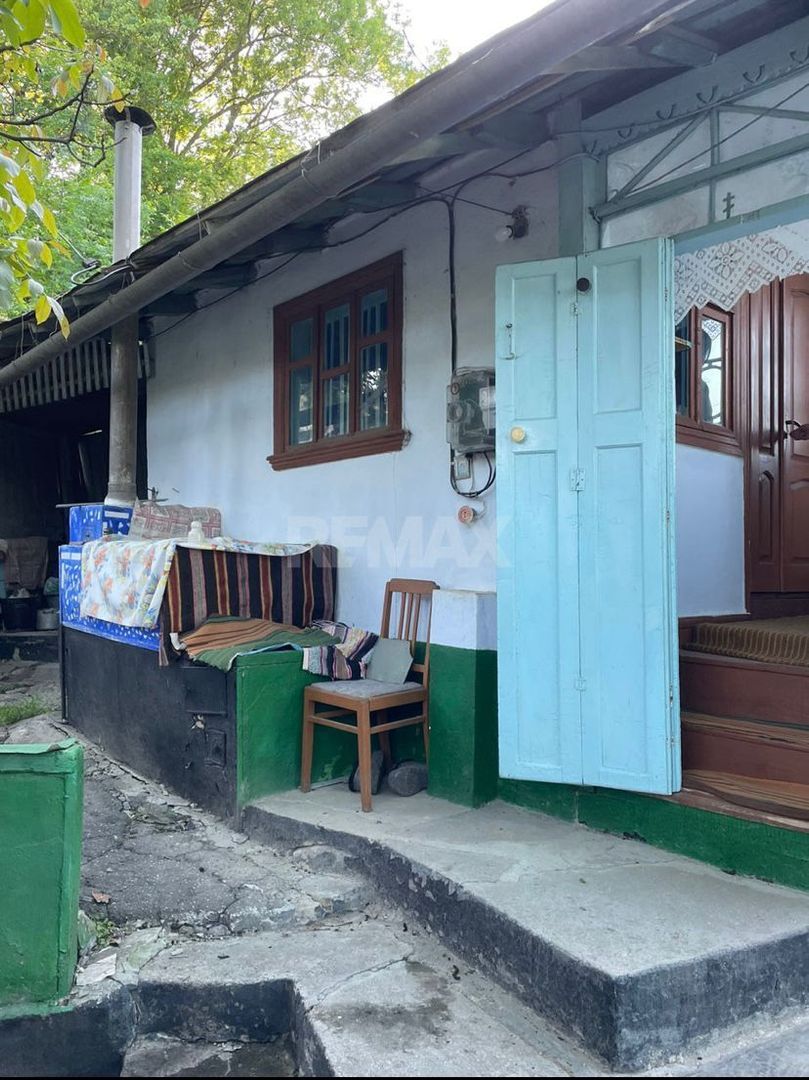 Casă de locuit în Scoreni - Poză 1