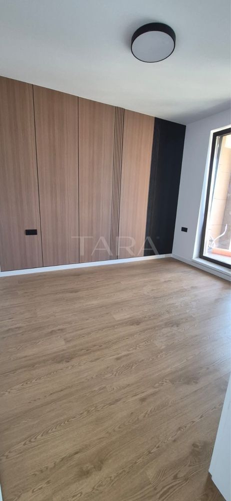 Apartament modern cu 2 camere, 54 mp + 4 mp, parcare subterană. - Poză 2
