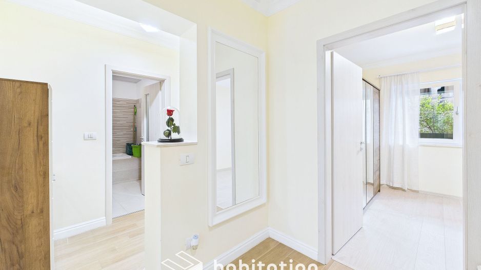 Apartament spațios cu curte și garaj – confortul unei case moderne - Poză 14