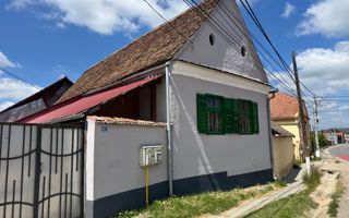 Casă la țară cu teren generos în satul Ruși - Poză 1
