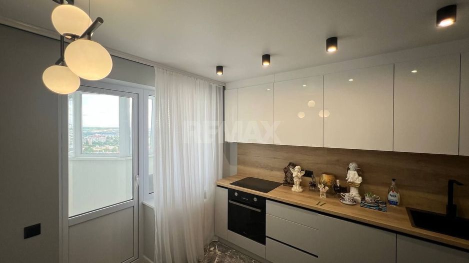Apartament  cu 1 Cameră + Living pe Bd. Dacia, Botanica - Poză 1