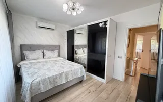 Casa P+1+M cu teren de 650 mp, piscina si curte complet amenajata - Poză 27