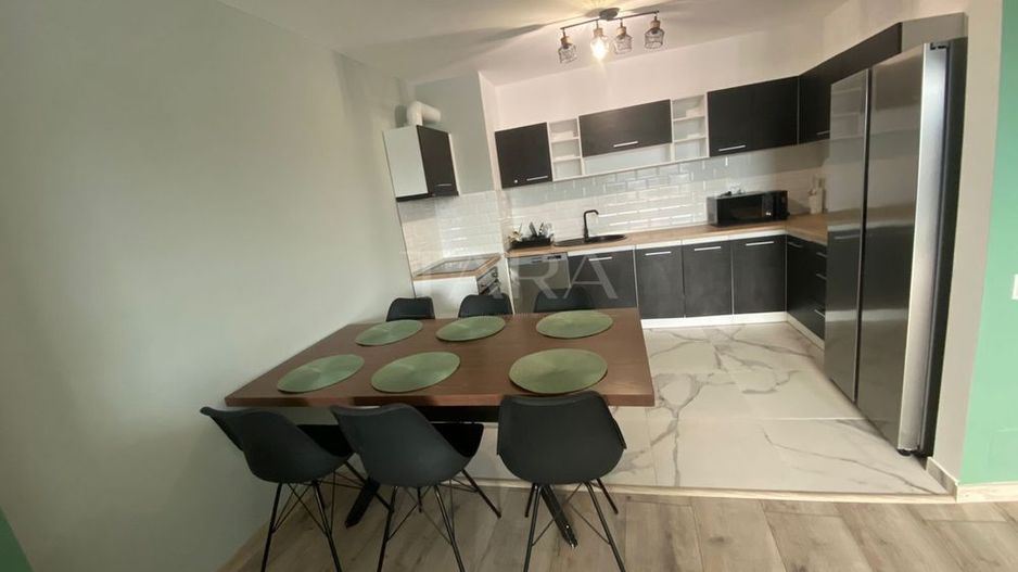 Penthouse elegant,  cu terasă de 15 mp și 2 parcări subterane. - Poză 2