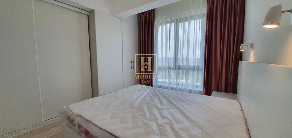 Apartament 2 camere,Dec.,54.6 mp Pacurari 133000 euro + loc de parcare - Poză 3