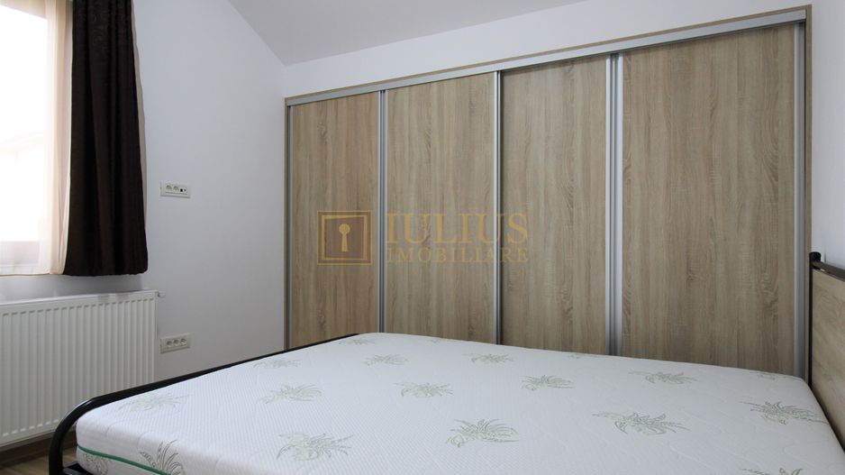 2 dormitoare, 80 mp utili, gradina si curte proprie de 300mp. - Poză 8