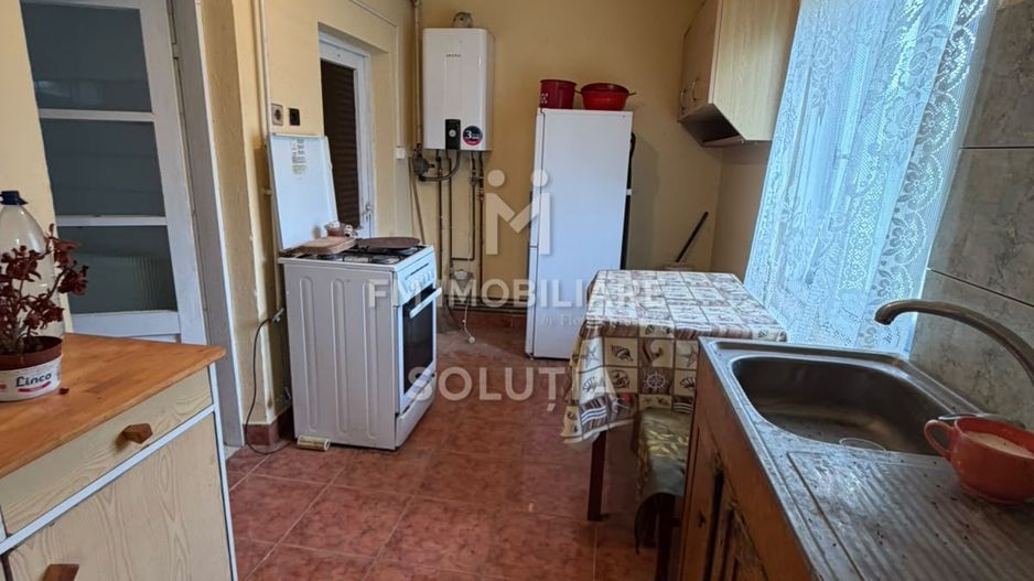 Casă cu teren generos în Buciumi - Poză 5