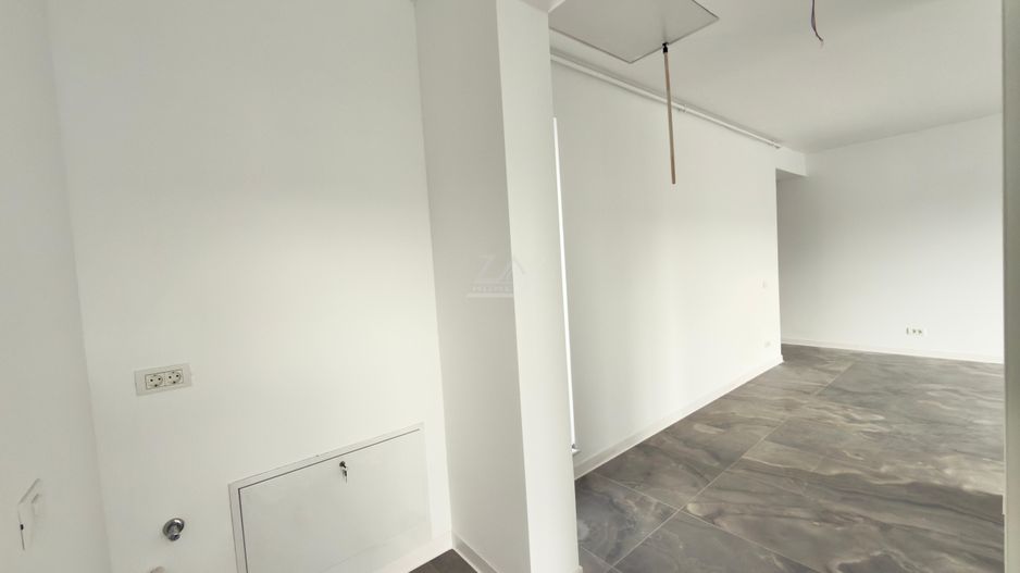 Bloc finalizat. Bucatarie inchisa. Loc de parcare. Spatiu depozitare - Poză 8