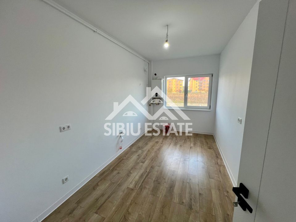 Apartament cu 3 camere, 2 bai, boxa 20 mp. loc de parcare -Finisat la cheie - Poză 3