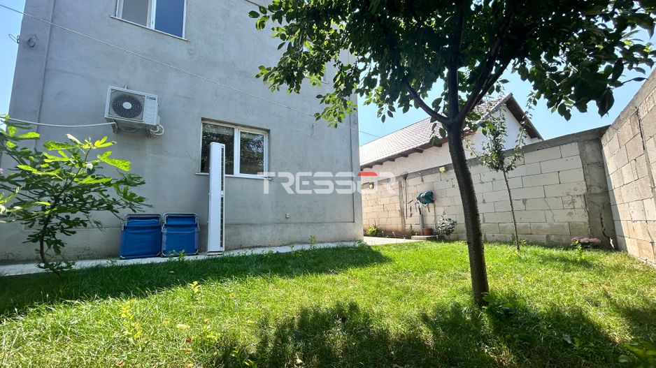 Casă P+1E cu terasă circulabilă, garaj amenajat și finisaje moderne - Poză 2