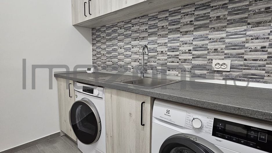 Garsoniera, 42 mp, decomandata, bucatarie 11 mp, mobilata/utilata - Poză 4