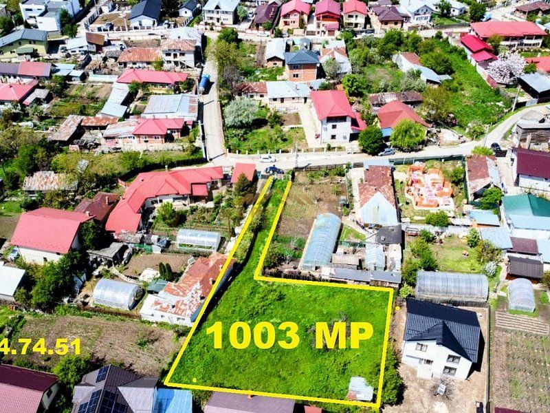 Teren construibil la intrare in comuna Berceni - Poză 1