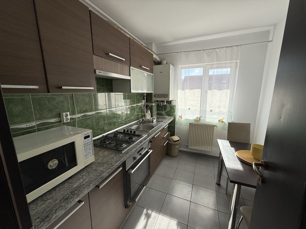 Apartament 2 camere decomandate, etaj 2 – zona La Roată Făget - Poză 1