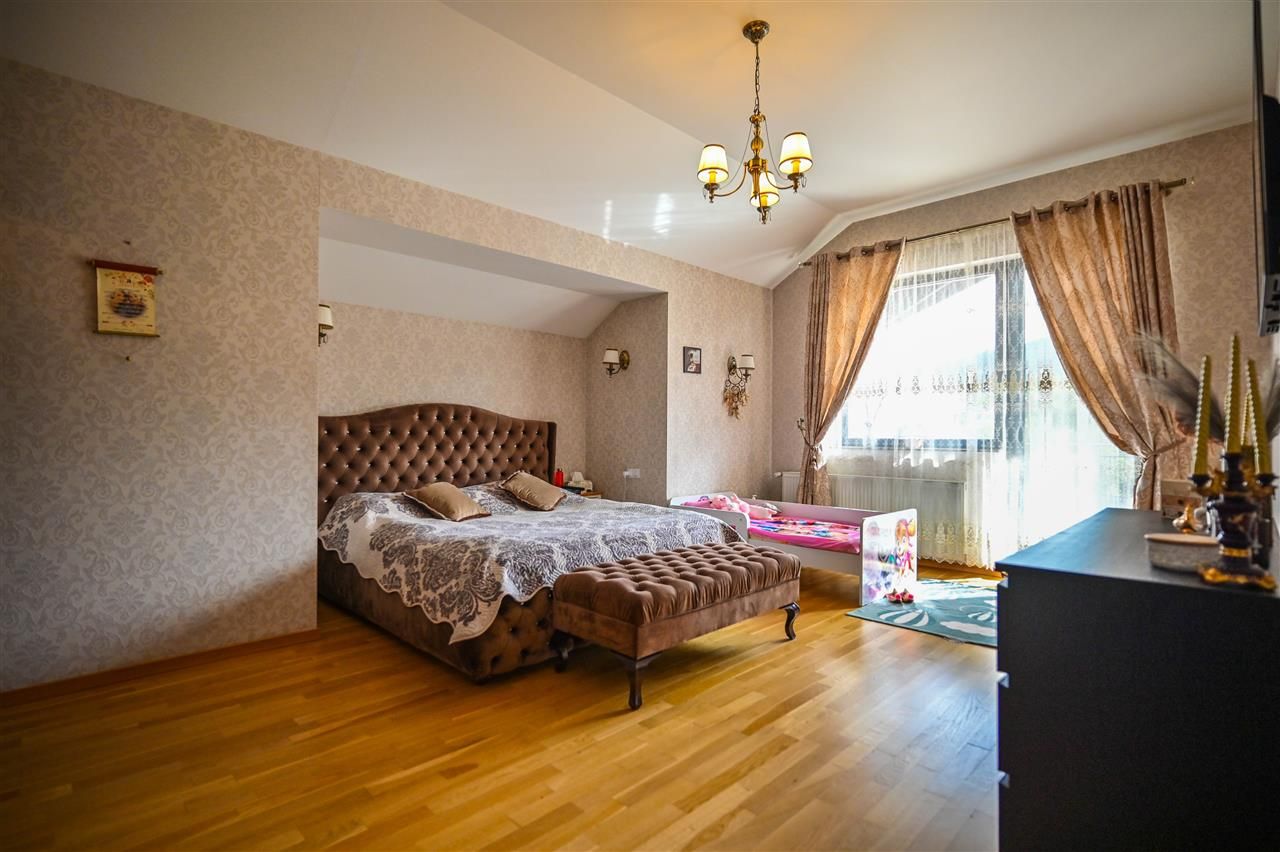 Somptuozitate in stil modern, 2 garaje, 3 terase, totul pe 1.000 mp teren - Poză 4