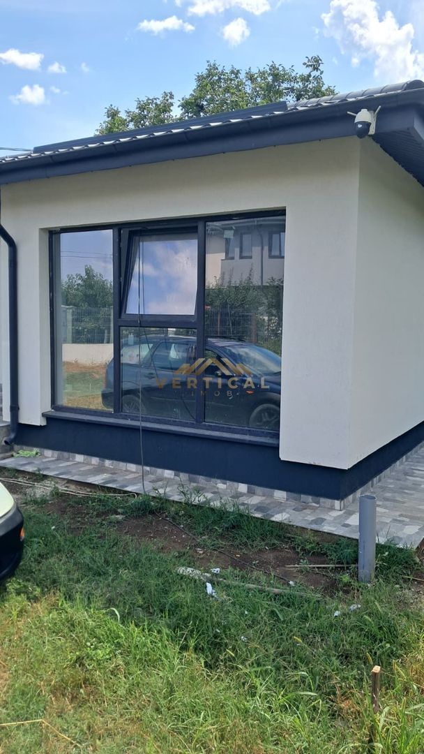 Casă individuală de vânzare – Confort, eficiență și curte proprie - Poză 1