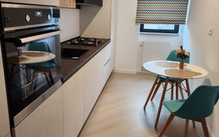 Proprietar inchiriez, studio Cortina North - Poză 1
