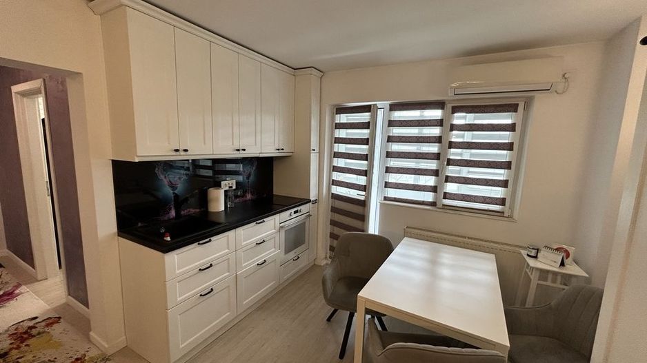 APARTAMENT RENOVAT COMPLET MOBILAT SI UTILAT  ZONA DOROBANTI - Poză 4