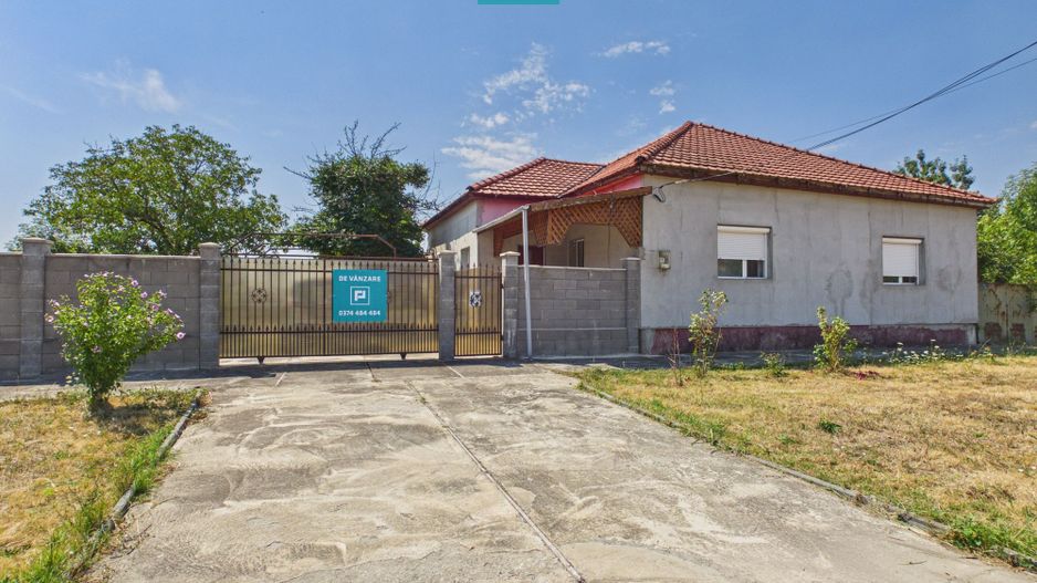 Casă individuală cu 4 camere și teren de 630 mp - Poză 1