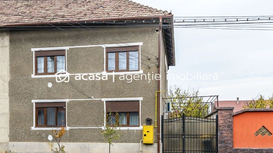 Casă tip duplex cu 2 apartamente în Poltura - Poză 1