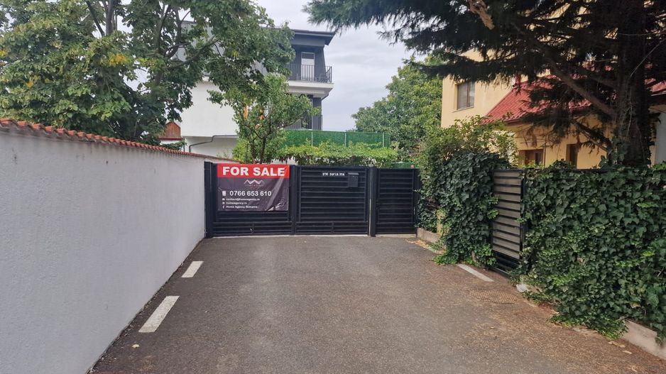 Casă individuală P+1+M cu garaj și terase spațioase – Otopeni Central - Poză 2