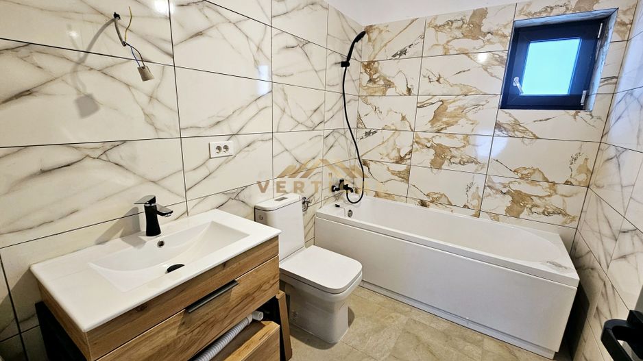 Casa 4 camere | 3 bai | centrul comunei Berceni - Poză 11