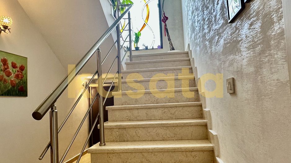 Vila care redefinește echilibrul între rafinament, spațiu și liniște - Poză 58