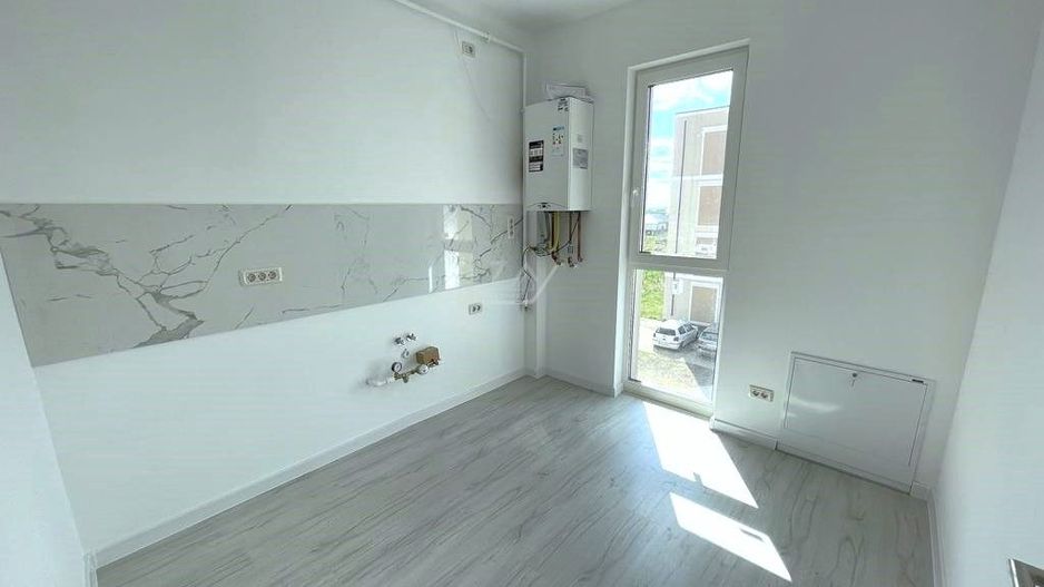 Bucatarie inchisa. Etaj 1. Parcare - Poză 2