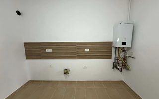 Apartament 1 camera la curte comuna cu centrala - Poză 2
