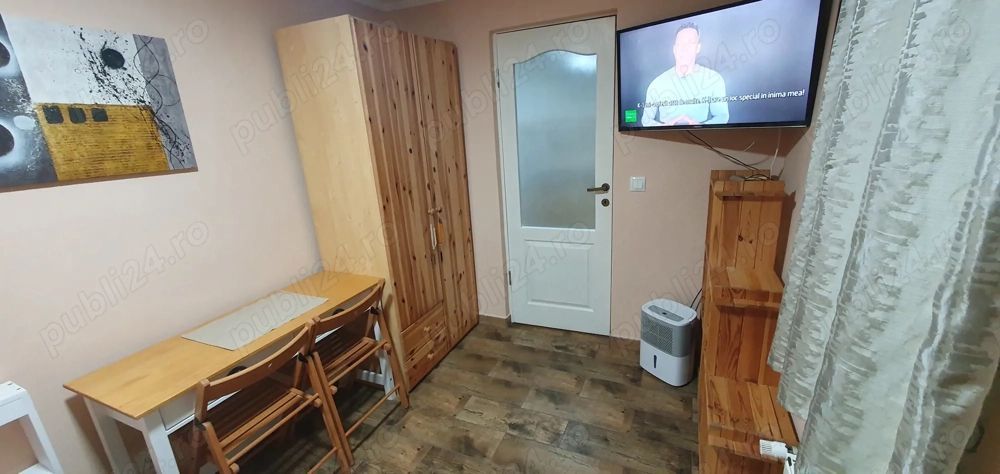 Închiriez garsonieră la casă,  Unirii, centrală proprie - Poză 5